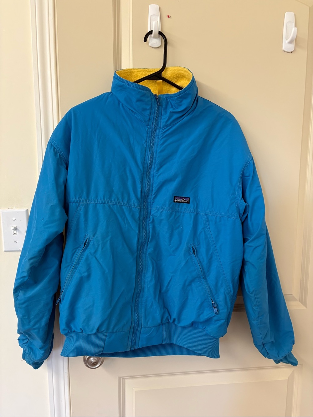 Patagonia Blue Bomber Jacket with Yellow Lining
